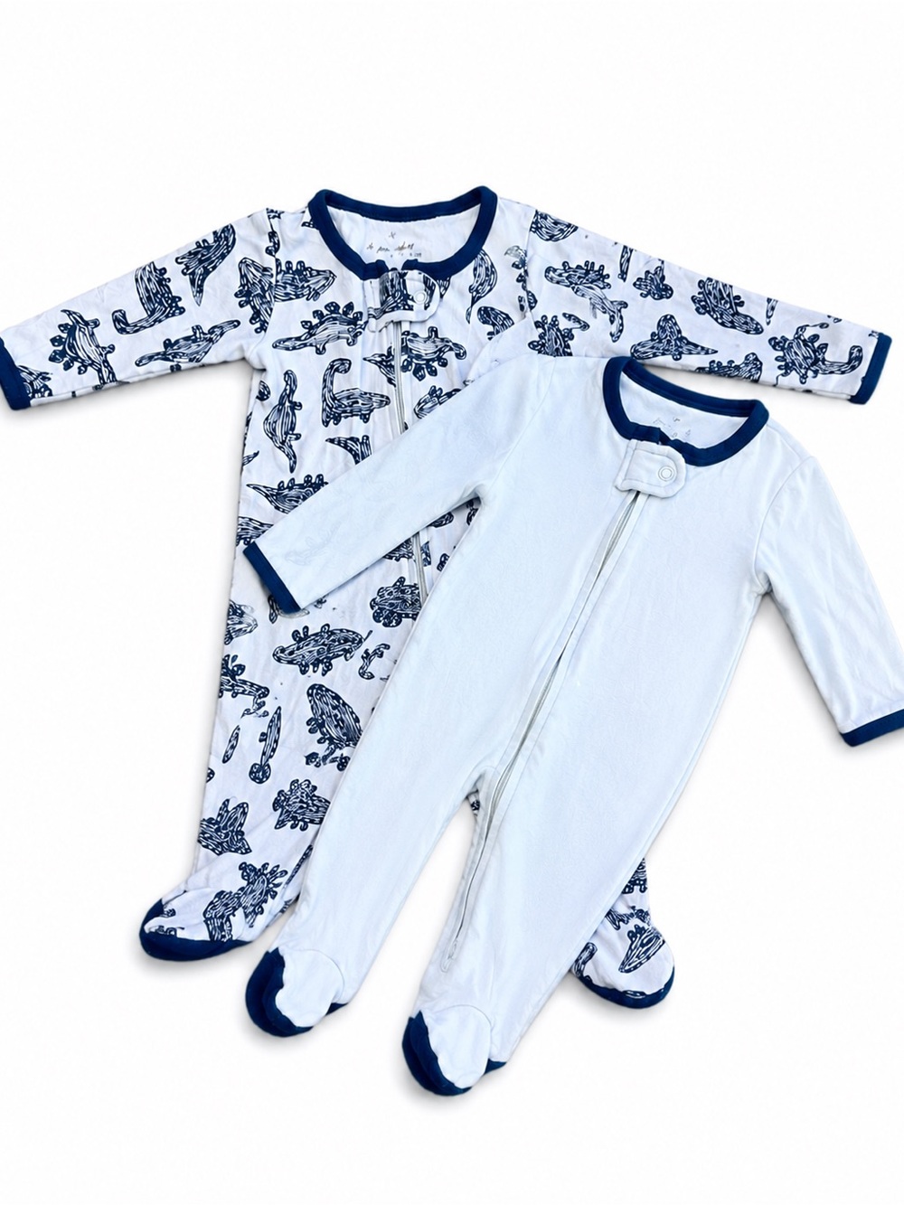 The peanut shell Baby Navy & White Dinosaur One-Piece Sleeper Set